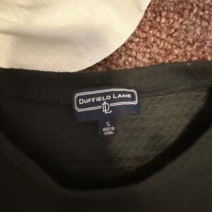 Duffield Lane Black Textured Knit Top with Plaid Ruffle Hem